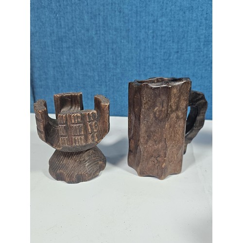 142 - A collection of wooden items to include 3x wooden crosses set into a wooden base along with 3x rusti... 