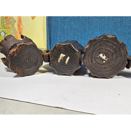 142 - A collection of wooden items to include 3x wooden crosses set into a wooden base along with 3x rusti... 