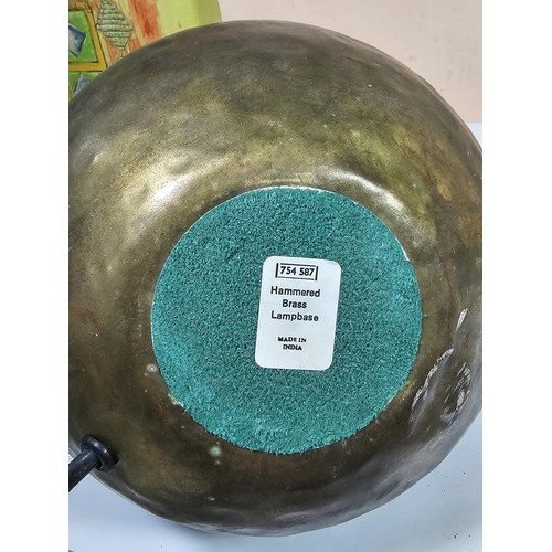 143 - A collection of three lights to include a brass table top light with a flexible neck, a brass lamp w... 