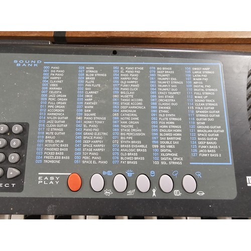 148 - A good quality Farfisa TK57 electronic keyboard with stand, in working order, has an electronic soun... 