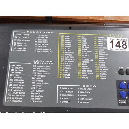 148 - A good quality Farfisa TK57 electronic keyboard with stand, in working order, has an electronic soun... 