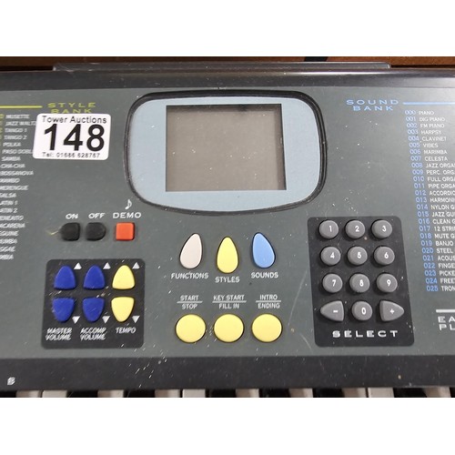 148 - A good quality Farfisa TK57 electronic keyboard with stand, in working order, has an electronic soun... 