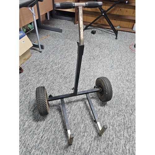 150A - A good quality heavy duty metal two wheeled trolley for transporting fishing equipment, set on a stu... 