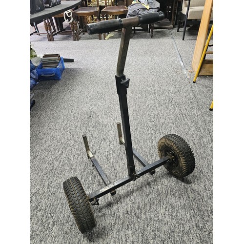 150A - A good quality heavy duty metal two wheeled trolley for transporting fishing equipment, set on a stu... 