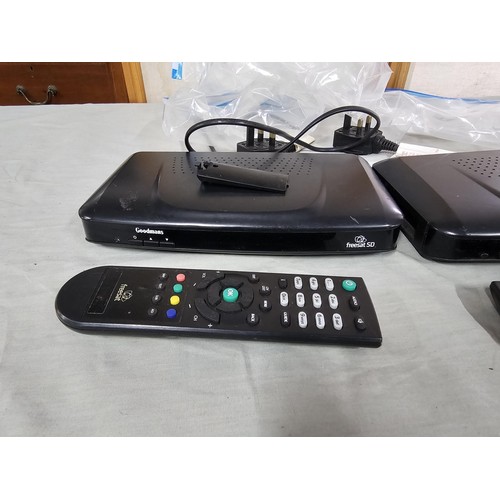 151 - A large collection of 7 sat boxes to include 2x Grundig Free sat boxes No. GUFSAT02SD,  3x Bush free... 