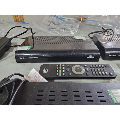 151 - A large collection of 7 sat boxes to include 2x Grundig Free sat boxes No. GUFSAT02SD,  3x Bush free... 