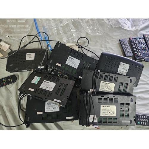 151 - A large collection of 7 sat boxes to include 2x Grundig Free sat boxes No. GUFSAT02SD,  3x Bush free... 