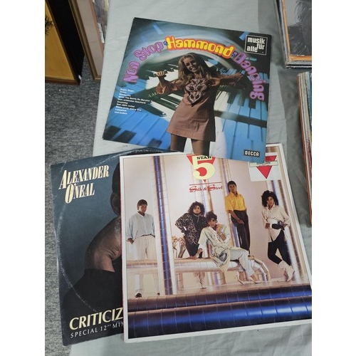 152 - A collection of LP's covering various genres to include Lionel Richie, Madonna, Leo Sayer, Rachmanin... 