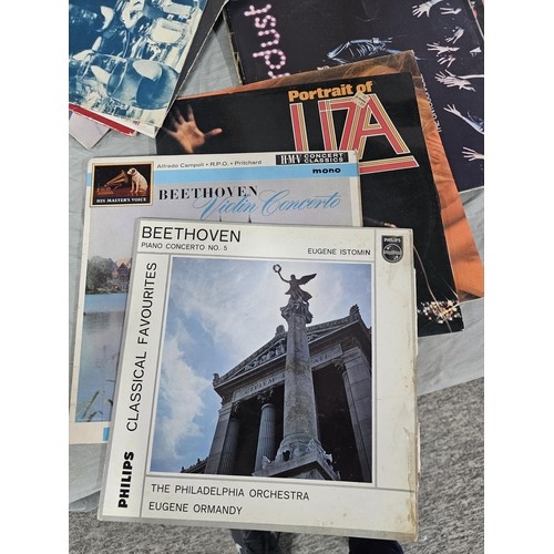 152 - A collection of LP's covering various genres to include Lionel Richie, Madonna, Leo Sayer, Rachmanin... 