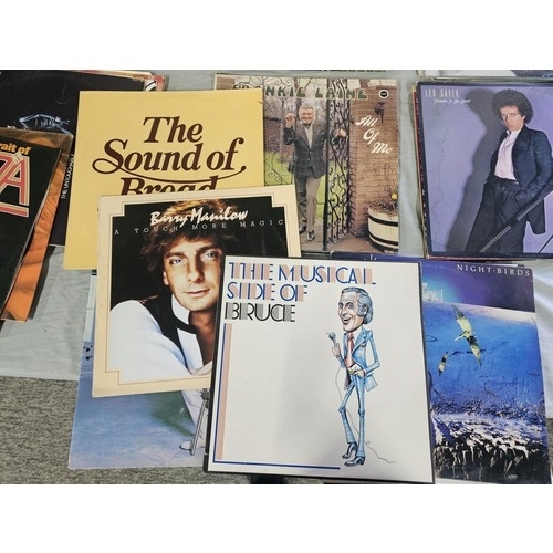 152 - A collection of LP's covering various genres to include Lionel Richie, Madonna, Leo Sayer, Rachmanin... 