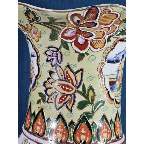 166 - Large and impressive hand painted and decorated Satsuma style vase, the vase depicts an oriental cer... 