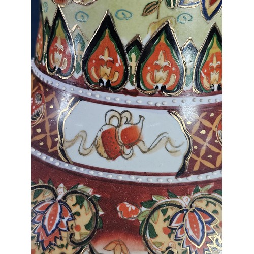 166 - Large and impressive hand painted and decorated Satsuma style vase, the vase depicts an oriental cer... 