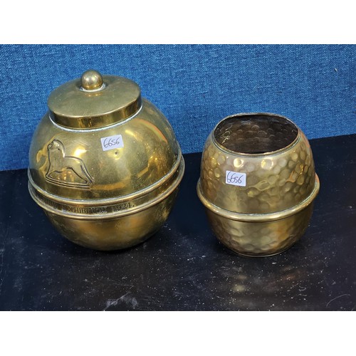 171 - A quantity of collectable brassware to include a Lipton tea orb shaped tea caddie with a lion symbol... 