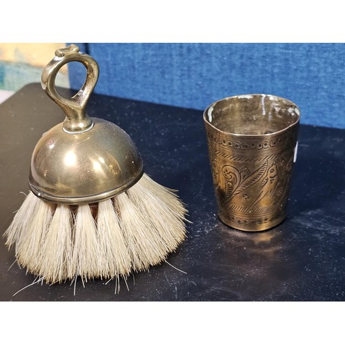 171 - A quantity of collectable brassware to include a Lipton tea orb shaped tea caddie with a lion symbol... 