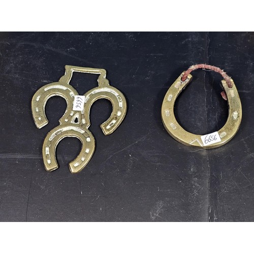 171 - A quantity of collectable brassware to include a Lipton tea orb shaped tea caddie with a lion symbol... 