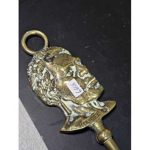 171 - A quantity of collectable brassware to include a Lipton tea orb shaped tea caddie with a lion symbol... 