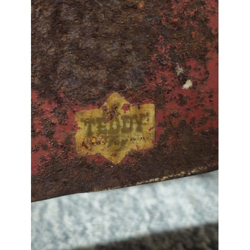 173 - A vintage metal Teddy pedal car in red in need of restoration, the car is stamped Teddy to the front... 