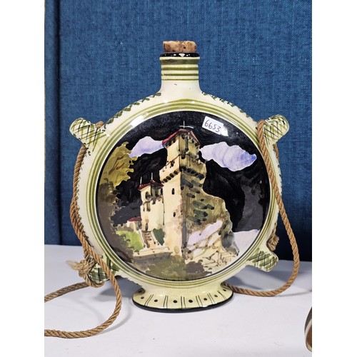 180 - A shelf containing a small quantity of collectables to include a Colibri ceramic tabletop lighter wi... 