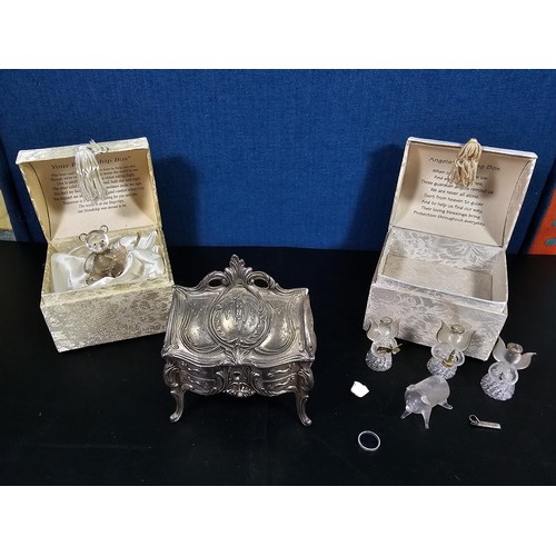 181 - A collection of 3 lidded boxes to include a  Angels Blessing box containing glass angels, a friendsh... 