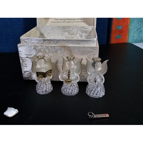 181 - A collection of 3 lidded boxes to include a  Angels Blessing box containing glass angels, a friendsh... 