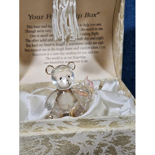 181 - A collection of 3 lidded boxes to include a  Angels Blessing box containing glass angels, a friendsh... 