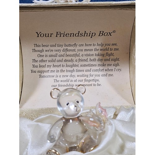 181 - A collection of 3 lidded boxes to include a  Angels Blessing box containing glass angels, a friendsh... 