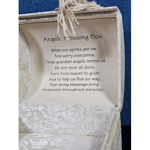 181 - A collection of 3 lidded boxes to include a  Angels Blessing box containing glass angels, a friendsh... 