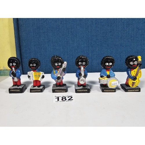 182 - A collection of 6 Robertson's Gollys from the band series to include a drummer, saxophonist, trumpet... 