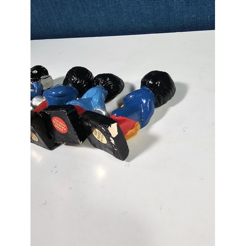 182 - A collection of 6 Robertson's Gollys from the band series to include a drummer, saxophonist, trumpet... 