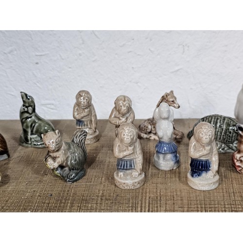 183 - A collection of 25 Wade Whimsies covering a selection of different animals to include chimpanzees, p... 