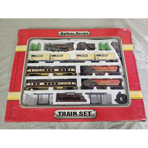 134 - A boxed complete plastic train set by the Railcar company, set appears complete including, the engin... 