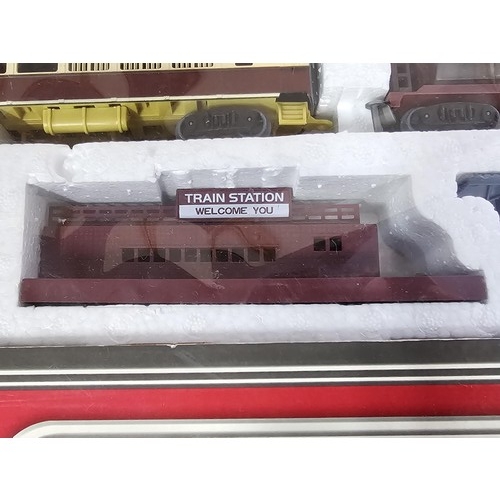 134 - A boxed complete plastic train set by the Railcar company, set appears complete including, the engin... 