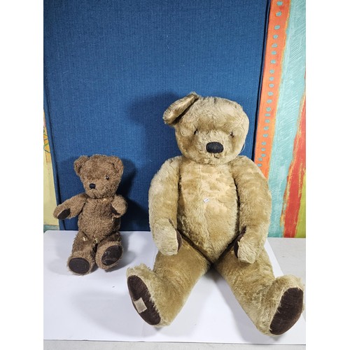 131 - A vintage Chad Valley teddy bear in need of restoration has been well loved has weat to his chest ar... 