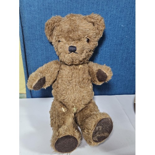 131 - A vintage Chad Valley teddy bear in need of restoration has been well loved has weat to his chest ar... 