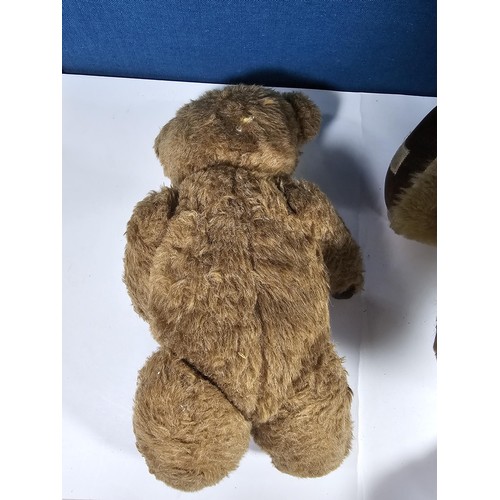 131 - A vintage Chad Valley teddy bear in need of restoration has been well loved has weat to his chest ar... 