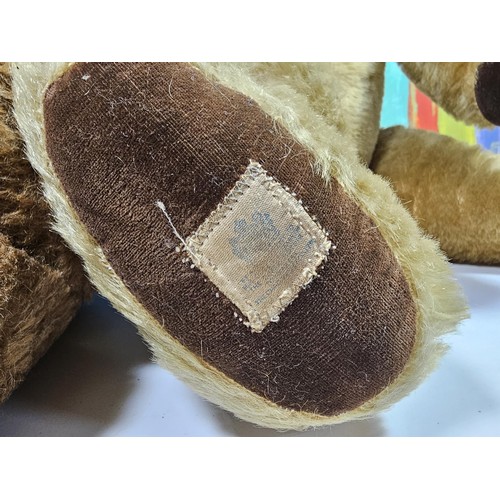 131 - A vintage Chad Valley teddy bear in need of restoration has been well loved has weat to his chest ar... 