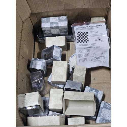 124 - Box containing a collection of 28 chess pieces relating to Lord of the Rings chess collection, simil... 