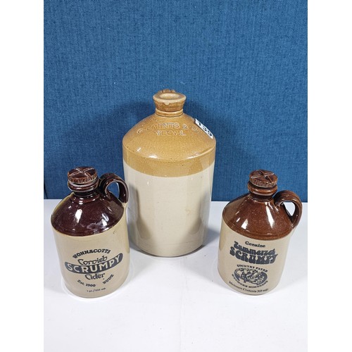 139 - A collection of Stoneware flagons to include a Clements and Sons of Yeovil flagon, along with two Co... 