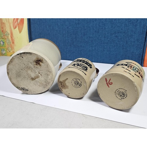 139 - A collection of Stoneware flagons to include a Clements and Sons of Yeovil flagon, along with two Co... 