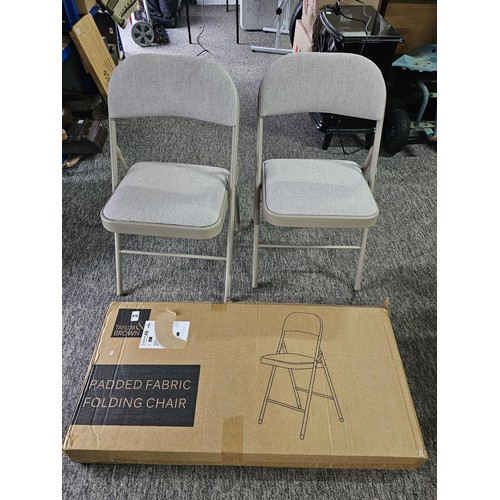 3 - A boxed as new Tailor & Brown padded fabric folding chairs in a beige colour, the box has been opene... 