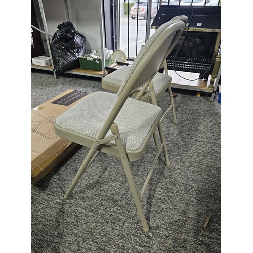 3 - A boxed as new Tailor & Brown padded fabric folding chairs in a beige colour, the box has been opene... 