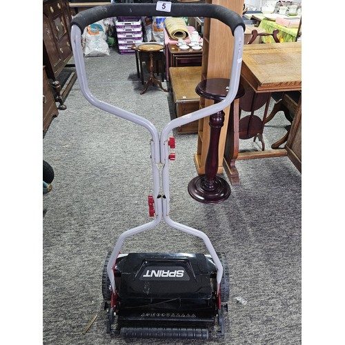 5 - A Sprint manual lawnmower with rubber handle and in good order. The blade has a width of 38cm (15