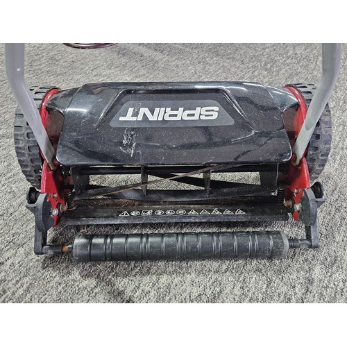 5 - A Sprint manual lawnmower with rubber handle and in good order. The blade has a width of 38cm (15