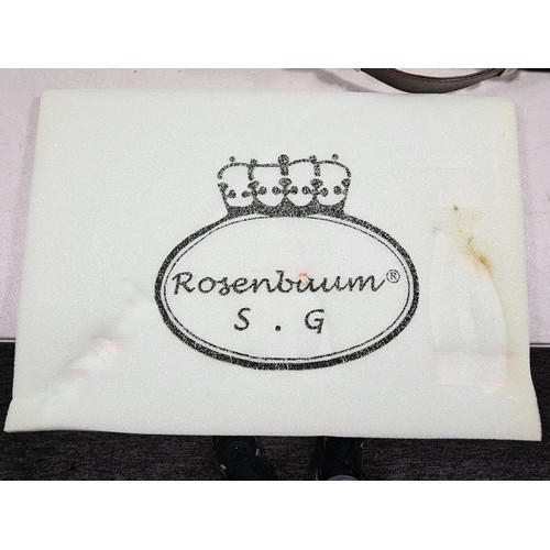 16 - A brown padded cased Rosenbaum set of kitchen knives and accessories on 2 trays, to include a full s... 