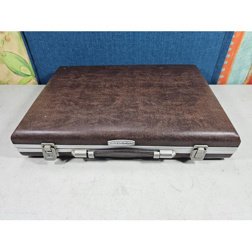 16 - A brown padded cased Rosenbaum set of kitchen knives and accessories on 2 trays, to include a full s... 