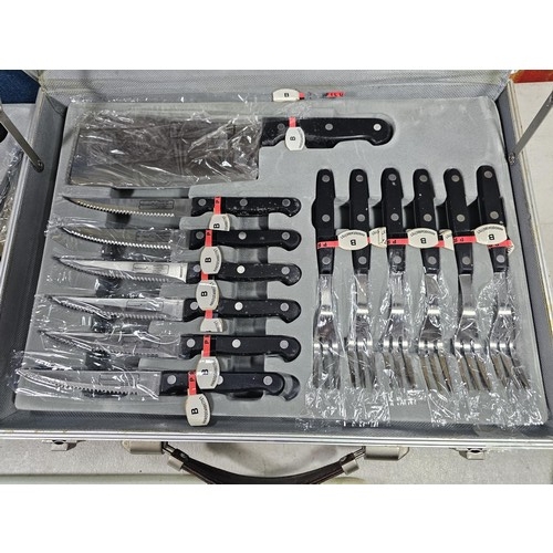 16 - A brown padded cased Rosenbaum set of kitchen knives and accessories on 2 trays, to include a full s... 