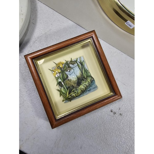 38 - A collection of 3 quartz battery operated clocks to include a wall hanging owl formed clock, a wall ... 