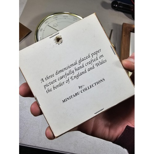 38 - A collection of 3 quartz battery operated clocks to include a wall hanging owl formed clock, a wall ... 