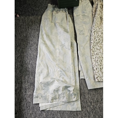 39 - 2x pairs of good quality curtains to include a pair of Dorma pale blue curtains with a floral design... 