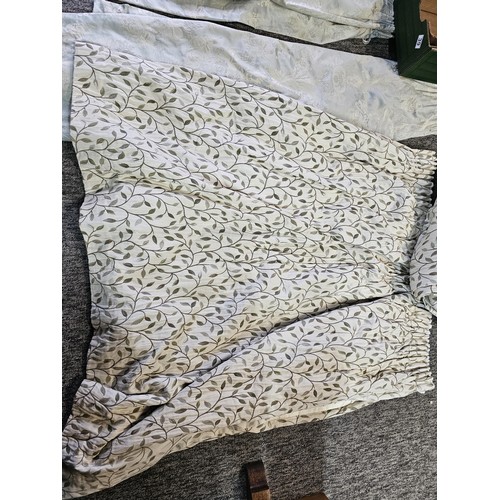39 - 2x pairs of good quality curtains to include a pair of Dorma pale blue curtains with a floral design... 